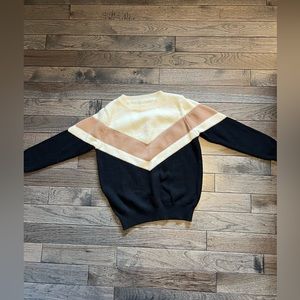 Black/cream/tan women’s sweater. Size small.
